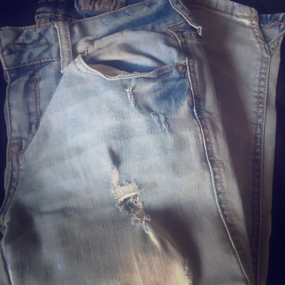 Blue washed up ripped jeans
